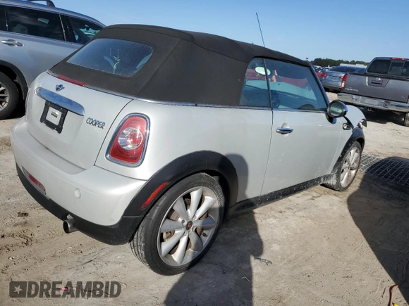 2015 MINI Convertible with VIN WMWZN3C50FT861992, listed as a Copart auction lot 84189754 with Not provided miles and Salvage title. Bid and sale history available at DreamBid. Image 3.