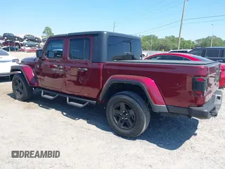 2021 Jeep Gladiator Freedom with VIN 1C6HJTAG2ML549434, listed as a IAAI auction lot 42059434 with 29,041 mi miles and . Bid and sale history available at DreamBid. Image 3.