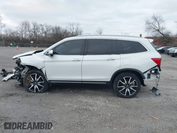 2020 Honda Pilot Touring 8-Passenger with VIN 5FNYF6H96LB056229, listed as a IAAI auction lot 41738249 with 65,099 mi miles and . Bid and sale history available at DreamBid. Image 15.