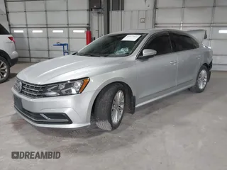 2016 Volkswagen Passat SE z VIN 1VWBT7A37GC027073, wystawiony jako IAAI lot #41073634 z przebiegiem 72 563 mil mil oraz . Historia ofert i sprzedaży dostępna na DreamBid. Obrazek 17.