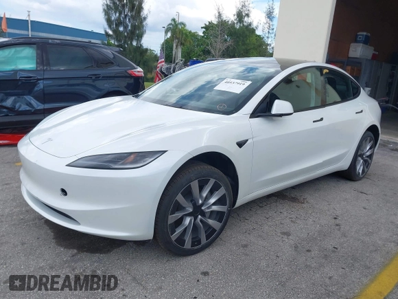 2024 Tesla Model 3 with VIN 5YJ3E1EA6RF751009, listed as a IAAI auction lot 40537919 with Not Provided miles and . Bid and sale history available at DreamBid. Image 2.