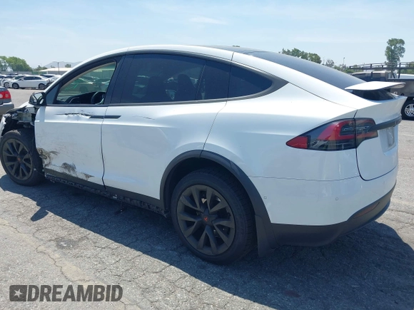 2016 Tesla Model X 70D z VIN 5YJXCAE29GF002170, wystawiony jako IAAI lot #42334842 z przebiegiem 119 104 mil mil oraz . Historia ofert i sprzedaży dostępna na DreamBid. Obrazek 3.