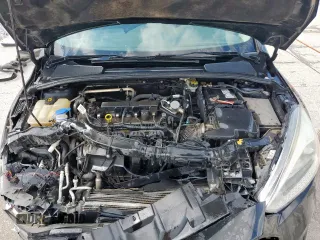 2015 Ford Focus SE with VIN 1FADP3F23FL242768, listed as a Copart auction lot 58068865 with 172,163 mi miles and Salvage title. Bid and sale history available at DreamBid. Image 11.