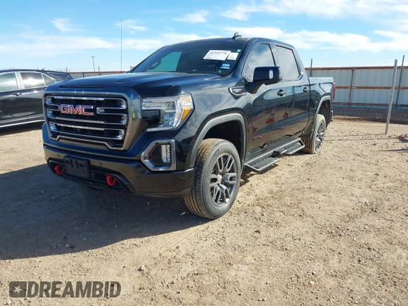 2021 GMC Sierra 1500 AT4 with VIN 1GTU9EETXMZ230606, listed as a IAAI auction lot 41599778 with 128,745 mi miles. Bid and sale history available at carsss.com. Image 2.