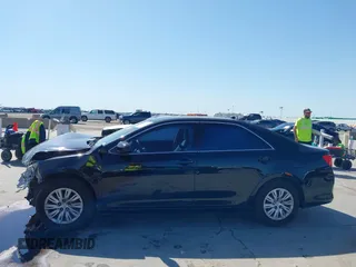 2013 Toyota Camry L with VIN 4T4BF1FK1DR308848, listed as a IAAI auction lot 42014028 with 192,645 mi miles. Bid and sale history available at carsss.com. Image 15.