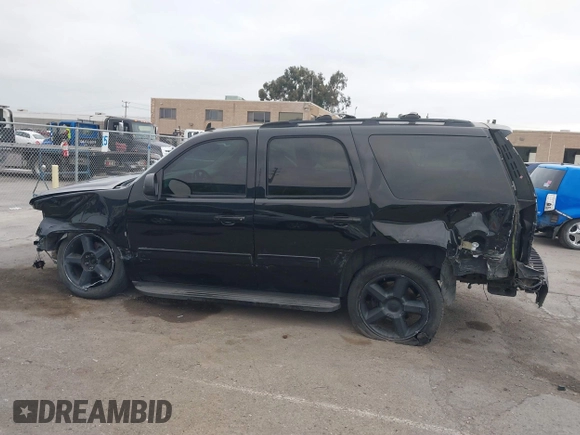 2013 Chevrolet Tahoe LT with VIN 1GNSKBE05DR152825, listed as a IAAI auction lot 41450863 with 157,305 mi miles and . Bid and sale history available at DreamBid. Image 15.