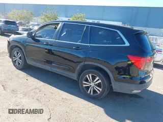 2018 Honda Pilot EX-L with VIN 5FNYF5H58JB013113, listed as a IAAI auction lot 41313206 with 125,825 mi miles. Bid and sale history available at carsss.com. Image 3.