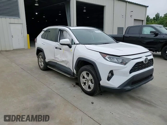 2019 Toyota RAV4 XLE with VIN 2T3P1RFV6KC060285, listed as a Copart auction lot 59195955 with 136,942 mi miles and Salvage title. Bid and sale history available at DreamBid. Image 13.