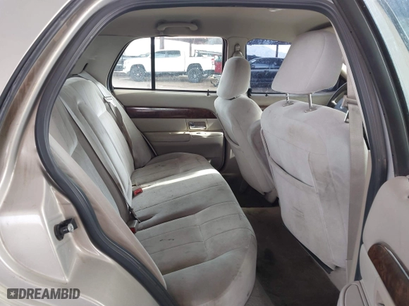 2006 Mercury Grand Marquis GS with VIN 2MEFM74VX6X638763, listed as a IAAI auction lot 41735612 with 123,914 mi miles. Bid and sale history available at carsss.com. Image 8.