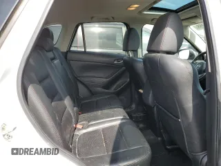 2014 Mazda CX-5 Grand Touring with VIN JM3KE4DY1E0361849, listed as a Copart auction lot 52043465 with 349,688 mi miles and Clean Title. Bid and sale history available at carsss.com. Image 11.
