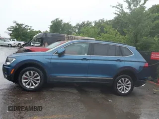 2018 Volkswagen Tiguan SEL with VIN 3VV2B7AX4JM019965, listed as a IAAI auction lot 42395783 with 107,822 mi miles and . Bid and sale history available at DreamBid. Image 14.