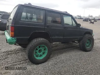 1993 Jeep Cherokee Sport with VIN 1J4FJ68S6PL506709, listed as a Copart auction lot 86638434 with 253,923 mi miles and Salvage Title. Bid and sale history available at carsss.com. Image 3.