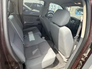 2005 Dodge Dakota ST with VIN 1D7HE28N75S204425, listed as a Copart auction lot 55522755 with 122,452 mi miles and Clean Title. Bid and sale history available at carsss.com. Image 6.