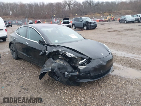 2018 Tesla Model 3 Long Range Battery with VIN 5YJ3E1EB1JF127289, listed as a IAAI auction lot 41484253 with 60,577 mi miles and . Bid and sale history available at DreamBid. Image 1.