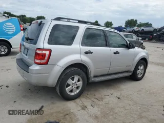 2008 Ford Escape XLS with VIN 1FMCU02Z88KE22266, listed as a Copart auction lot 63067385 with 214,026 mi miles and Salvage title. Bid and sale history available at DreamBid. Image 3.