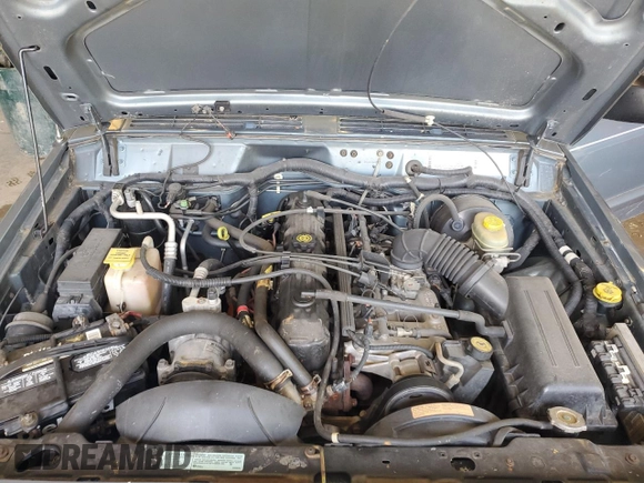 1998 Jeep Cherokee Country with VIN 1J4FT78S8WL252502, listed as a Copart auction lot 59664545 with 133,148 mi miles and Salvage title. Bid and sale history available at DreamBid. Image 11.