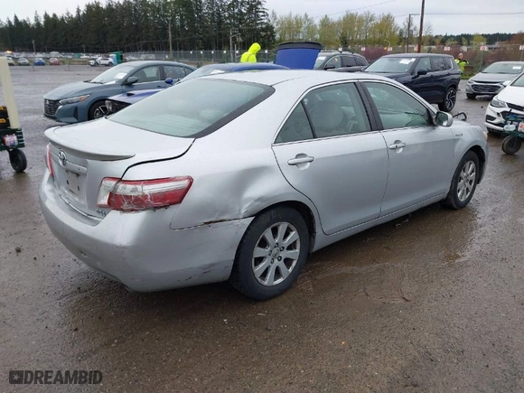 2007 Toyota Camry Hybrid with VIN JTNBB46K673021121, listed as a IAAI auction lot 41988725 with 266,907 mi miles. Bid and sale history available at carsss.com. Image 4.