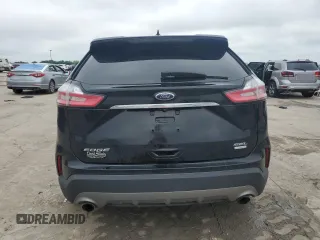 2020 Ford Edge SEL z VIN 2FMPK3J90LBA44070, wystawiony jako Copart lot #54606065 z przebiegiem 63 153 mil mil oraz Szkoda całkowita • Salvage title. Historia ofert i sprzedaży dostępna na DreamBid. Obrazek 6.