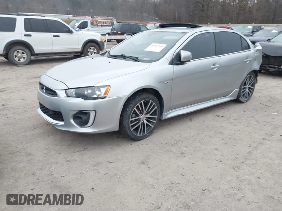 2016 Mitsubishi Lancer GT with VIN JA32U8FW1GU008973, listed as a IAAI auction lot 41293100 with 84,075 mi miles. Bid and sale history available at carsss.com. Image 17.