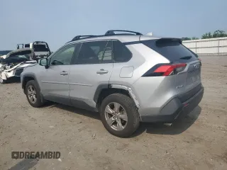 2023 Toyota RAV4 Hybrid XLE with VIN JTMRWRFV7PD166743, listed as a Copart auction lot 59964505 with 87,404 mi miles and Salvage title. Bid and sale history available at DreamBid. Image 2.