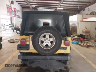 2005 Jeep Wrangler Unlimited with VIN 1J4FA44S95P373346, listed as a IAAI auction lot 41707821 with 175,865 mi miles. Bid and sale history available at carsss.com. Image 16.