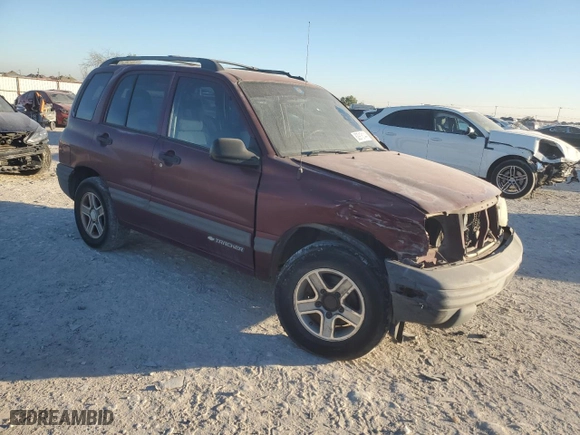 2003 Chevrolet Tracker with VIN 2CNBE13C336934957, listed as a Copart auction lot 82918144 with NaN miles and Salvage Title. Bid and sale history available at carsss.com. Image 4.