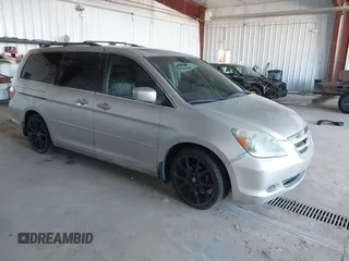 2006 Honda Odyssey EX-L z VIN 5FNRL387X6B413006, wystawiony jako IAAI lot #41687289 z przebiegiem 192 701 mil mil oraz . Historia ofert i sprzedaży dostępna na DreamBid. Obrazek 1.