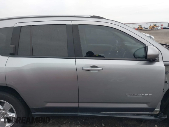 2016 Jeep Compass Latitude with VIN 1C4NJCEA2GD719694, listed as a IAAI auction lot 41508771 with 121,469 mi miles. Bid and sale history available at carsss.com. Image 14.