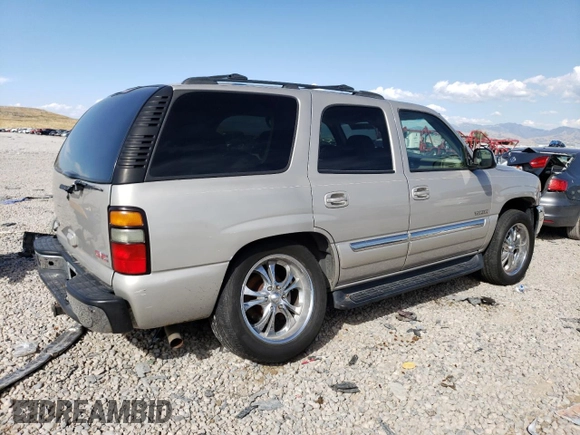 2004 GMC Yukon SLT with VIN 1GKEK13Z04J140148, listed as a Copart auction lot 52411494 with 167,629 mi miles and Salvage Title. Bid and sale history available at carsss.com. Image 3.