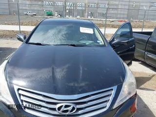 2012 Hyundai Azera with VIN KMHFH4JGXCA146499, listed as a IAAI auction lot 42519685 with 132,262 mi miles and . Bid and sale history available at DreamBid. Image 6.