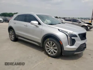 2021 Cadillac XT4 FWD Premium Luxury z VIN 1GYFZCR42MF004233, wystawiony jako Copart lot #57229385 z przebiegiem 98 387 mil mil oraz Szkody całkowita. Historia ofert i sprzedaży dostępna na DreamBid. Obrazek 4.