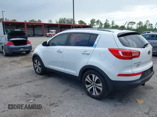 2013 Kia Sportage EX with VIN KNDPC3A21D7528487, listed as a IAAI auction lot 42556813 with 144,823 mi miles and . Bid and sale history available at DreamBid. Image 3.