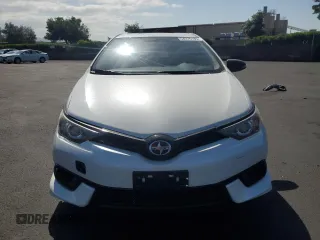 2016 Scion iM z VIN JTNKARJE3GJ521136, wystawiony jako Copart lot #54276185 z przebiegiem 110 186 mil mil oraz Szkoda całkowita • Salvage title. Historia ofert i sprzedaży dostępna na DreamBid. Obrazek 5.