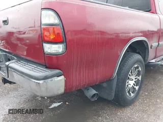 2002 Toyota Tundra SR5 with VIN 5TBRN34112S231284, listed as a IAAI auction lot 41886121 with 364,985 mi miles and . Bid and sale history available at DreamBid. Image 12.