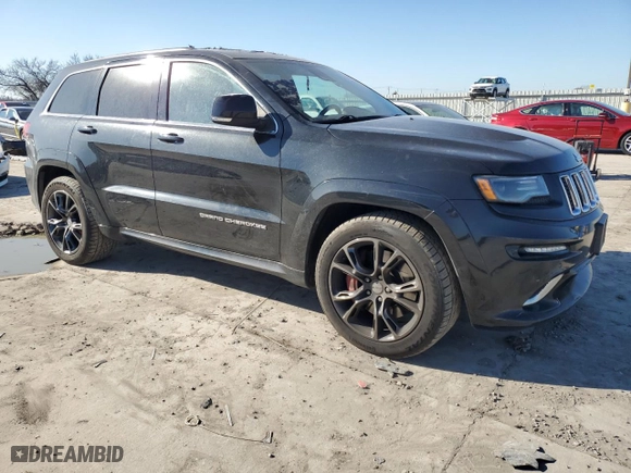 2015 Jeep Grand Cherokee SRT with VIN 1C4RJFDJ7FC613234, listed as a Copart auction lot 47537205 with 125,275 mi miles and Clean Title. Bid and sale history available at carsss.com. Image 4.