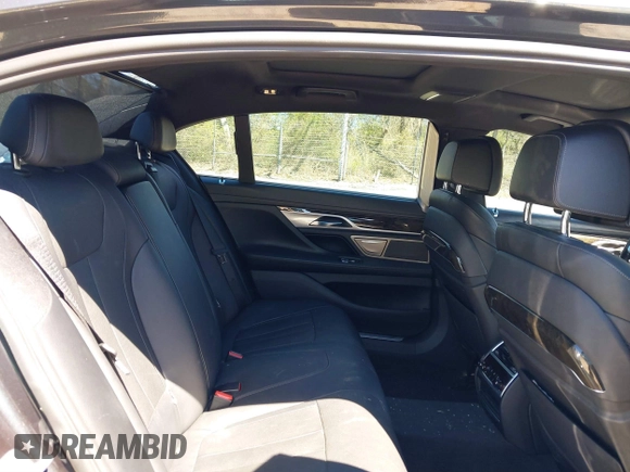 2016 BMW 7 Series 740i with VIN WBA7E2C54GG714649, listed as a IAAI auction lot 41815220 with 89,029 mi miles. Bid and sale history available at carsss.com. Image 8.