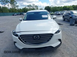 2022 Mazda CX-9 Touring z VIN JM3TCBCY7N0600787, wystawiony jako IAAI lot #42240512 z przebiegiem 27 927 mil mil oraz . Historia ofert i sprzedaży dostępna na DreamBid. Obrazek 12.