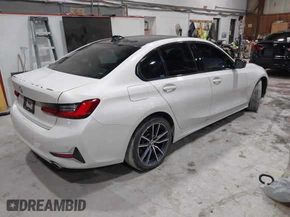 2019 BMW 3 Series 330i xDrive with VIN WBA5R7C55KAJ83482, listed as a IAAI auction lot 41565321 with 126,536 mi miles. Bid and sale history available at carsss.com. Image 4.