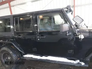 2008 Jeep Wrangler Unlimited Rubicon with VIN 1J8GA69108L562705, listed as a IAAI auction lot 41306923 with 150,002 mi miles and . Bid and sale history available at DreamBid. Image 13.