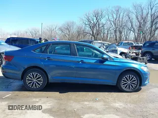 2021 Volkswagen Jetta S z VIN 3VWC57BU0MM009093, wystawiony jako IAAI lot #41643969 z przebiegiem 54 723 mil mil oraz . Historia ofert i sprzedaży dostępna na DreamBid. Obrazek 13.
