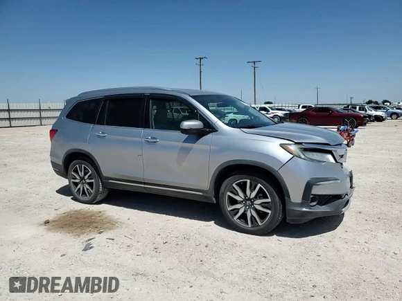 2019 Honda Pilot Elite with VIN 5FNYF6H09KB057259, listed as a Copart auction lot 56770835 with 74,492 mi miles and Salvage title. Bid and sale history available at DreamBid. Image 15.