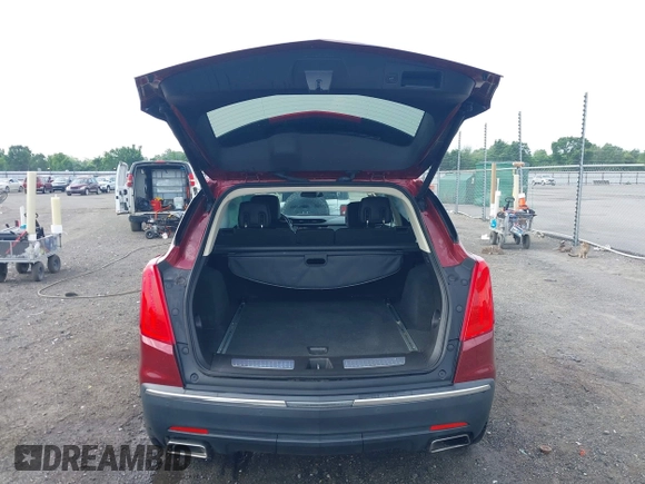 2018 Cadillac XT5 Premium Luxury FWD z VIN 1GYKNERS2JZ242842, wystawiony jako IAAI lot #42297159 z przebiegiem 72 008 mil mil oraz . Historia ofert i sprzedaży dostępna na DreamBid. Obrazek 17.