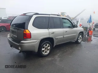 2002 GMC Envoy SLT with VIN 1GKDS13S322491528, listed as a IAAI auction lot 41482996 with 251,182 mi miles. Bid and sale history available at carsss.com. Image 4.