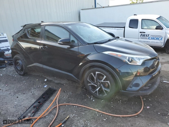 2018 Toyota C-HR XLE with VIN NMTKHMBX0JR022189, listed as a Copart auction lot 52457155 with 97,506 mi miles and Salvage Title. Bid and sale history available at carsss.com. Image 4.
