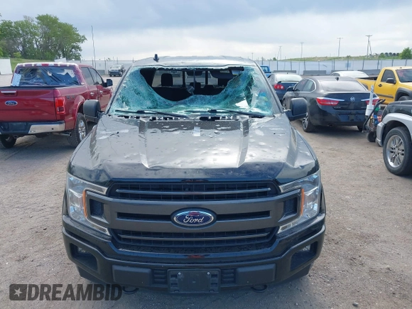2018 Ford F-150 XL with VIN 1FTEW1E56JKF92265, listed as a IAAI auction lot 42285305 with 95,712 mi miles and . Bid and sale history available at DreamBid. Image 6.