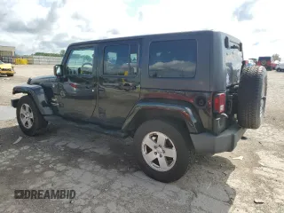 2007 Jeep Wrangler Unlimited Sahara with VIN 1J4GA59197L121262, listed as a Copart auction lot 61551685 with 233,309 mi miles and Clean title. Bid and sale history available at DreamBid. Image 2.