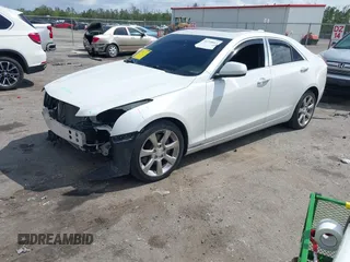 2016 Cadillac ATS Standard AWD z VIN 1G6AG5RX9G0106151, wystawiony jako IAAI lot #41710613 z przebiegiem 82 893 mil mil oraz . Historia ofert i sprzedaży dostępna na DreamBid. Obrazek 2.