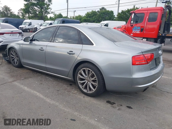 2011 Audi A8 with VIN WAUAVAFD0BN018197, listed as a IAAI auction lot 42221435 with 74,465 mi miles and . Bid and sale history available at DreamBid. Image 3.
