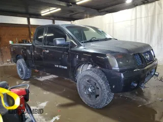 2006 Nissan Titan SE with VIN 1N6BA06A96N567659, listed as a Copart auction lot 61928495 with 190,594 mi miles and Salvage title. Bid and sale history available at DreamBid. Image 4.