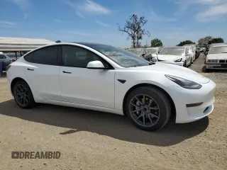 2023 Tesla Model 3 с VIN 5YJ3E1EA7PF452786, выставлен на аукционе Copart как лот 52570005 с пробегом 61 492 миль миль и Списание • Salvage title. История ставок и продаж доступна на DreamBid. Изображение 4.